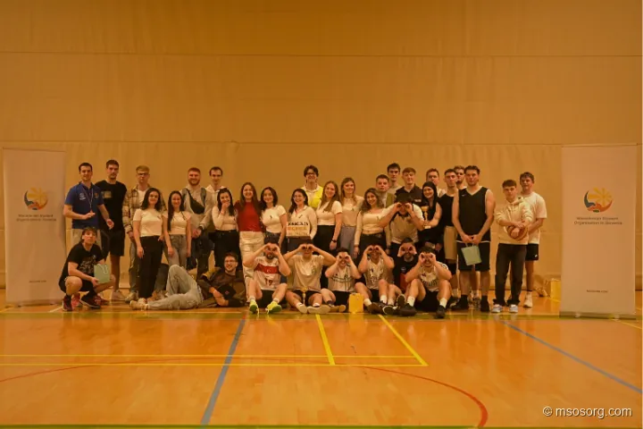 A memorable moment with the organizing team and the victorious basketball and futsal squads.