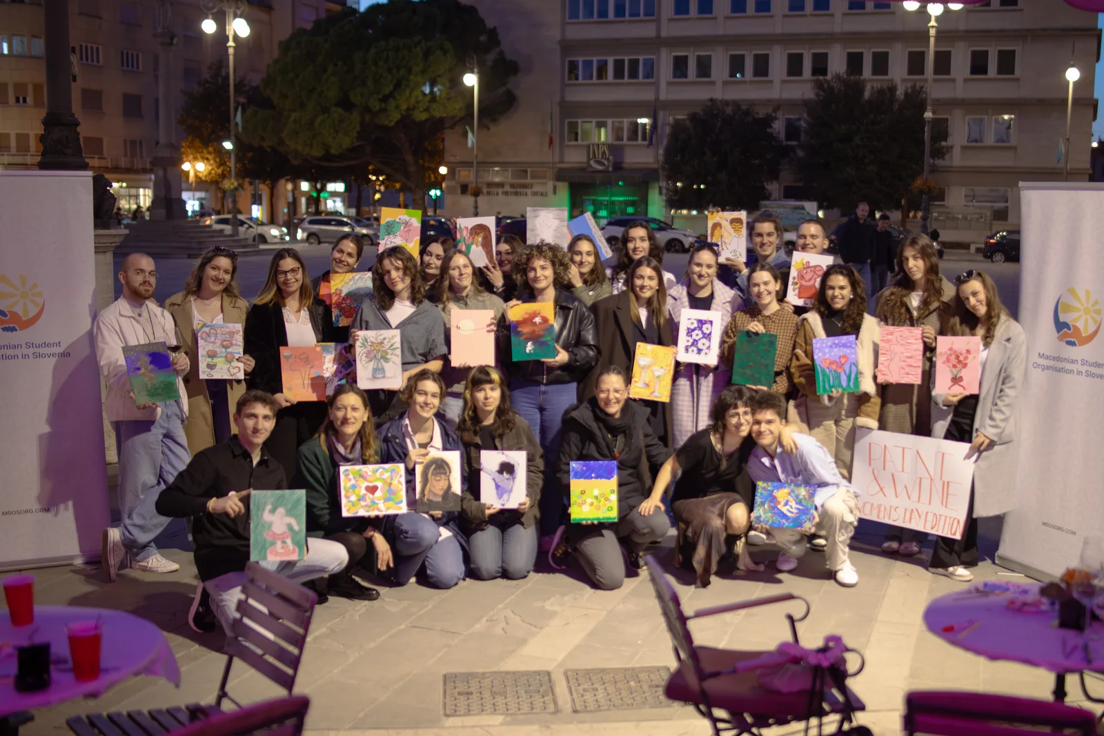 Students writing their names in Cyrillic at Macedonian Student Night